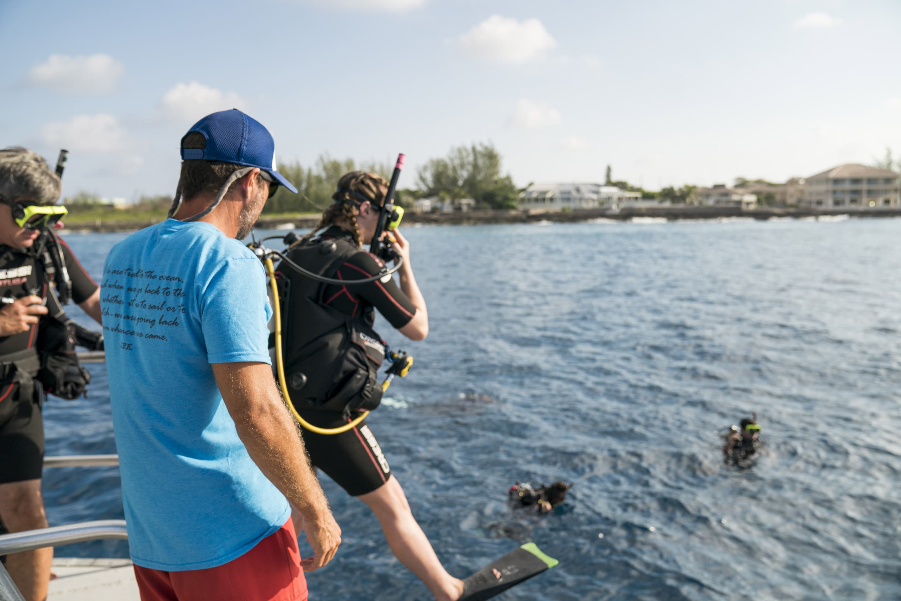 Divers preparing for a guided boat dive