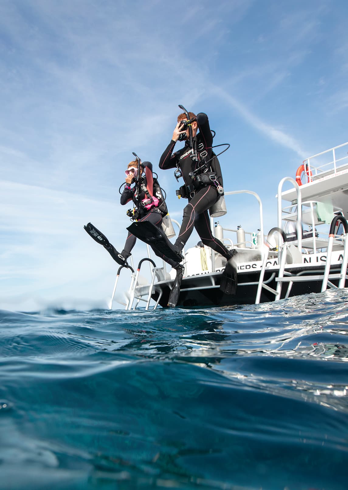 Diver preparing equipment before a refresher dive